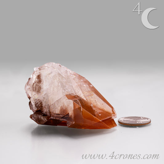 Red Diamond Calcite, glassy, gemmy diamond shaped geometries otherwise known as rhombohedrons and or scalenohedrons are combined with iron oxide hematoid inclusions. www.4crones.com