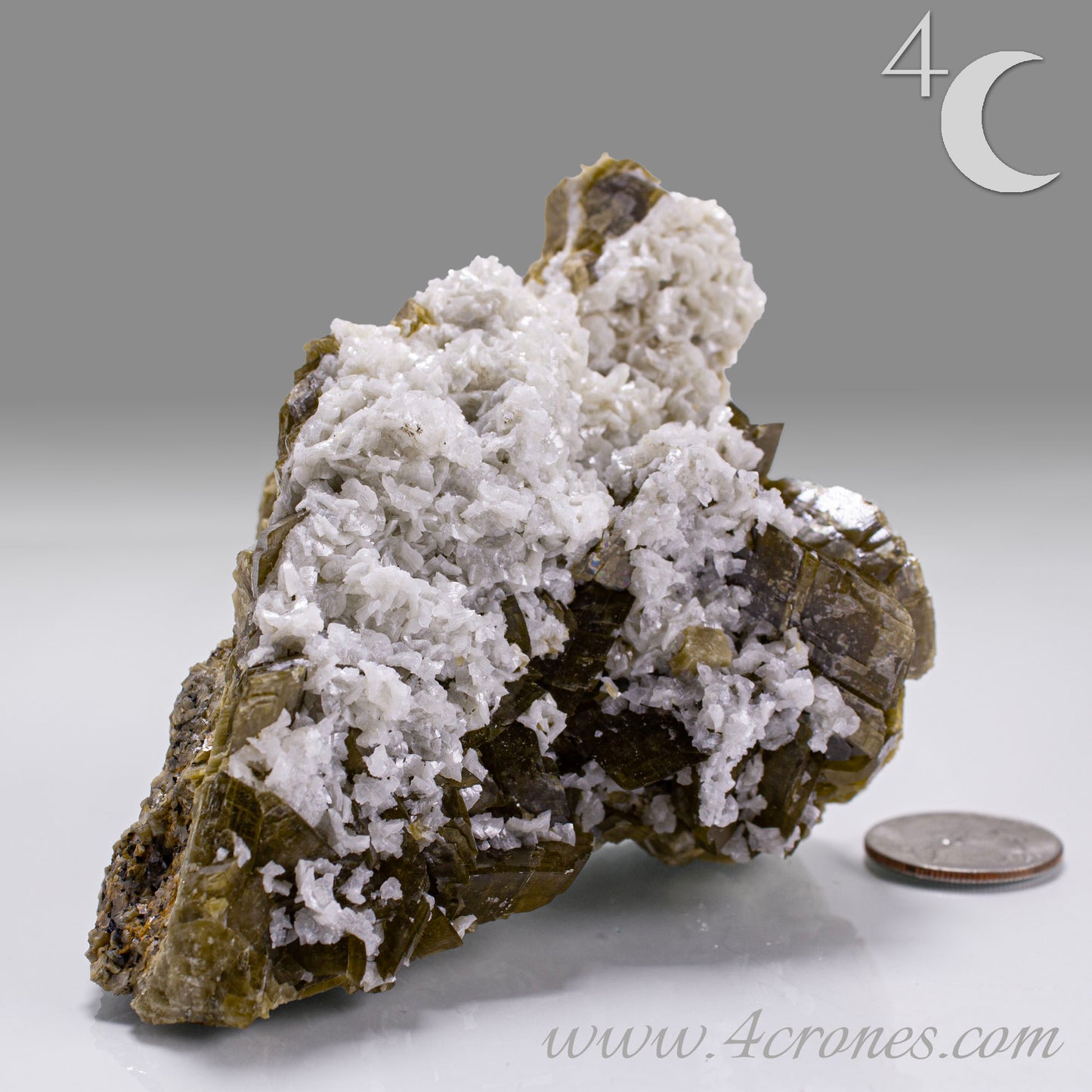 This unique pairing of Siderite, an iron carbonate mineral, and Dolomite, a calcium magnesium carbonate, forms in earthy clusters and blocky crystals that range from honeyed brown to soft cream.