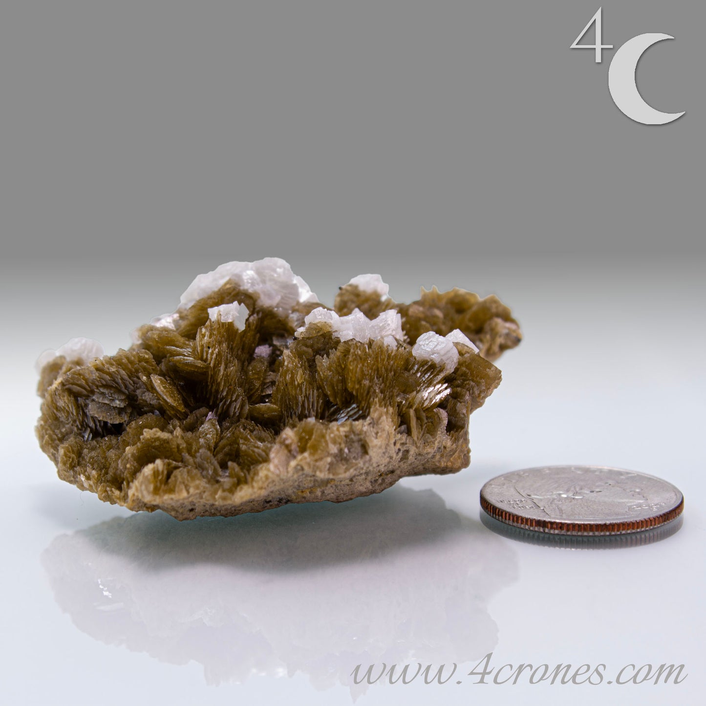 This unique pairing of Siderite, an iron carbonate mineral, and Dolomite, a calcium magnesium carbonate, forms in earthy clusters and blocky crystals that range from honeyed brown to soft cream.