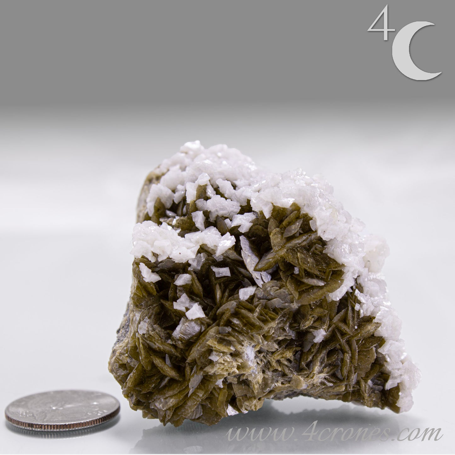 This unique pairing of Siderite, an iron carbonate mineral, and Dolomite, a calcium magnesium carbonate, forms in earthy clusters and blocky crystals that range from honeyed brown to soft cream.