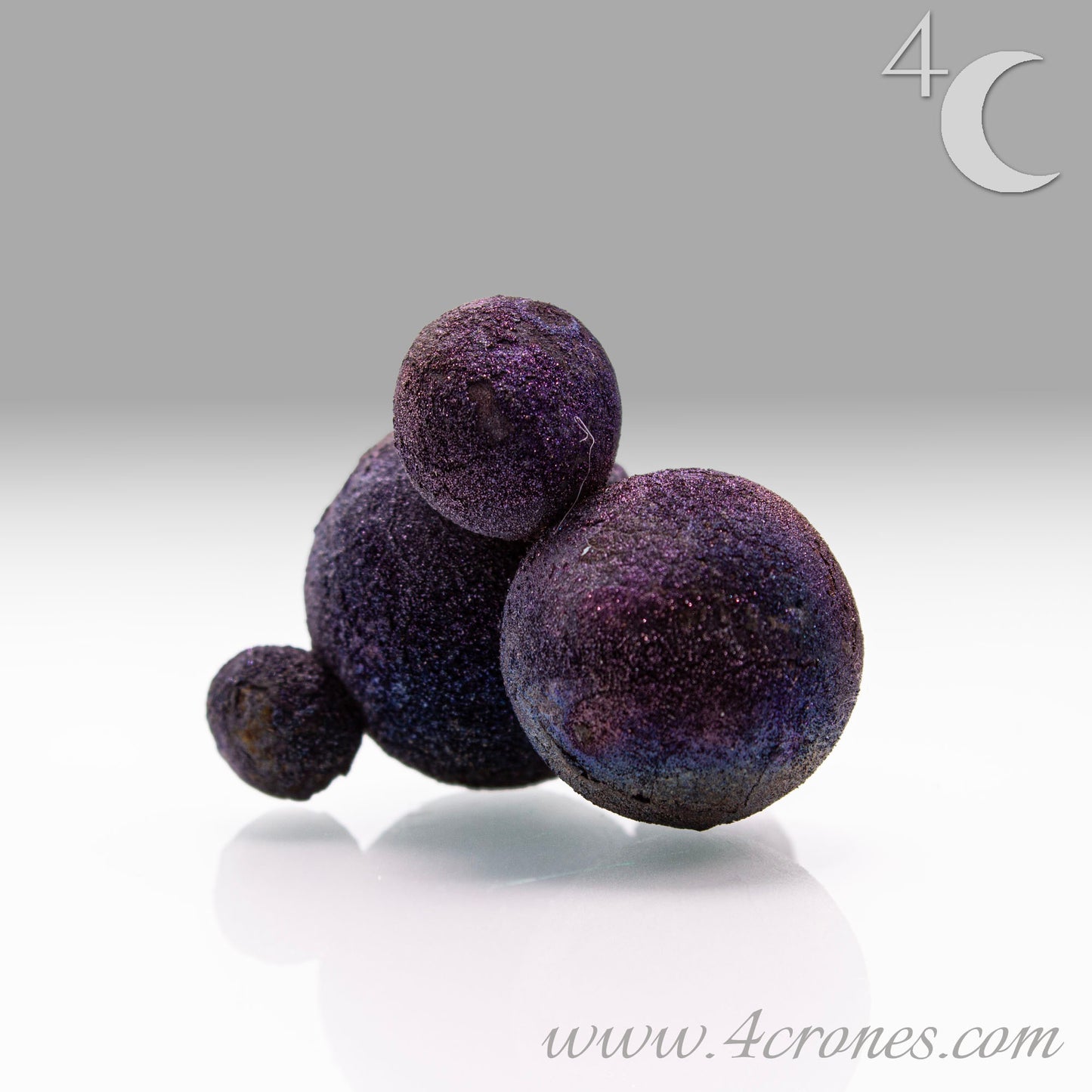 These stunning Chalcopyrite copper iron sulfide spheres (CuFeS₂) showcase a metallic golden luster with vibrant iridescent hues of purple, blue, and green. Formed through hydrothermal processes in Daye, Hubei Province, they crystallize in the tetragonal system and are valued for their aesthetic and energetic properties.