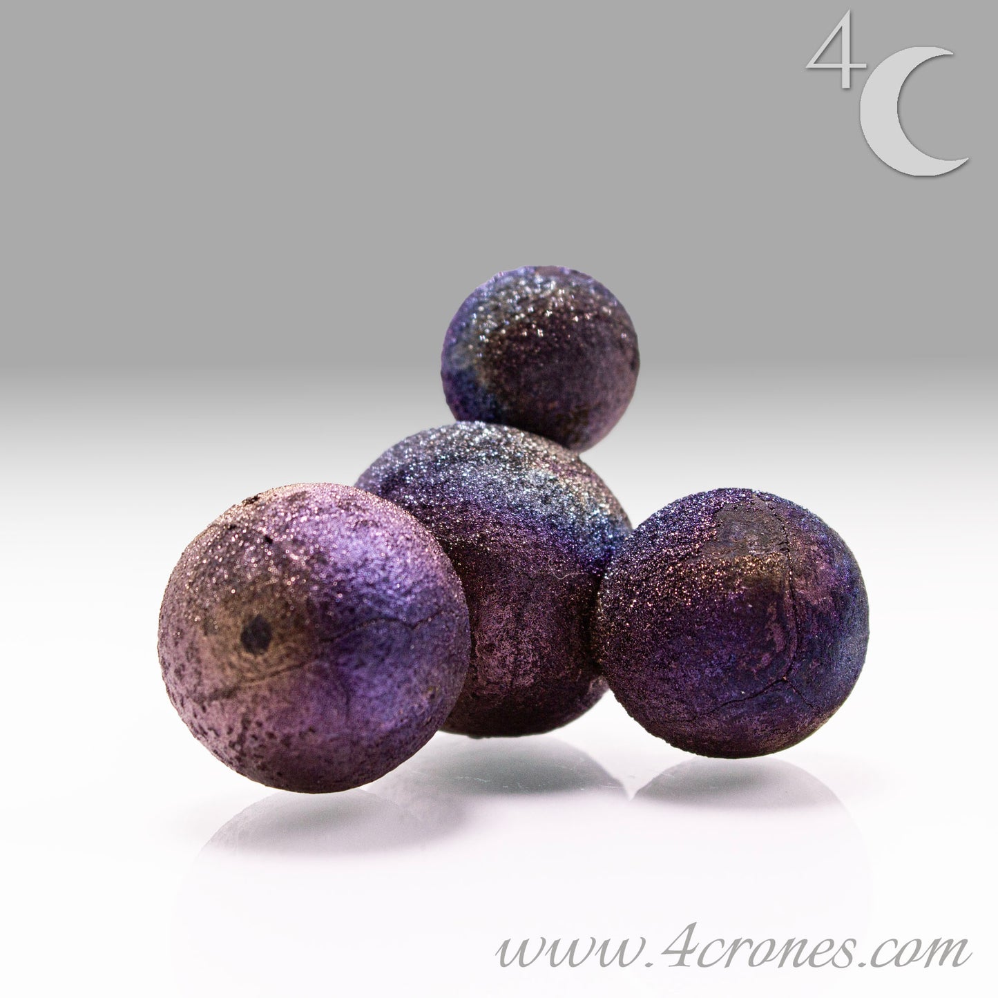 These stunning Chalcopyrite copper iron sulfide spheres (CuFeS₂) showcase a metallic golden luster with vibrant iridescent hues of purple, blue, and green. Formed through hydrothermal processes in Daye, Hubei Province, they crystallize in the tetragonal system and are valued for their aesthetic and energetic properties.