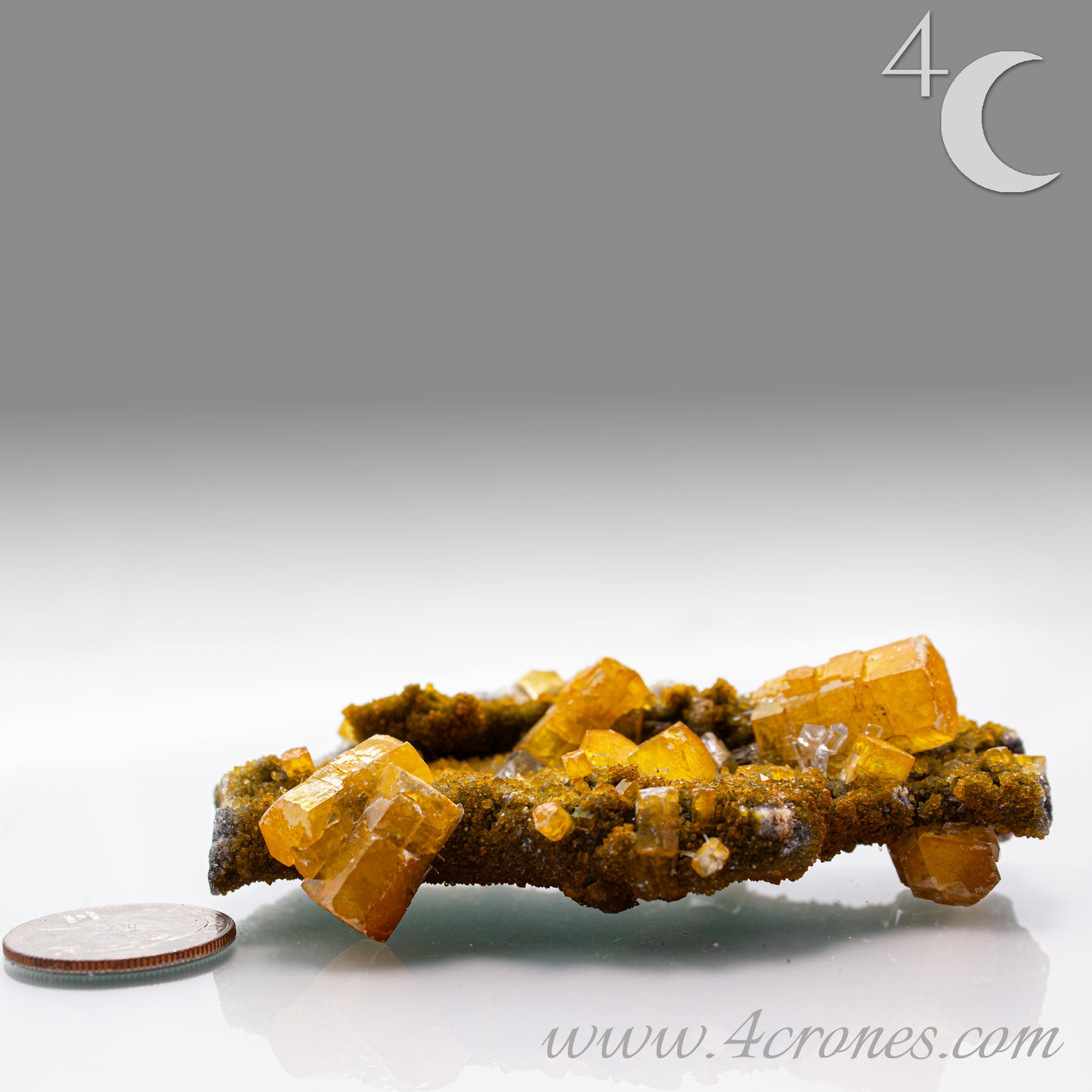 Iridescent Columnar Calcite is a striking variety of calcite distinguished by its naturally occurring columnar structure and shimmering, pearlescent sheen. This calcium carbonate mineral forms in elongated, parallel crystal columns, often displaying a soft, ethereal glow due to light interference within its layers. Its iridescence results from microscopic structural variations that reflect and refract light, producing subtle flashes of color that shift with movement. 