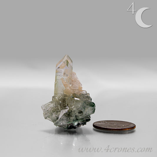 Clear apophyllite crystals intergrown with peach stilbite, natural zeolite mineral specimen from India.