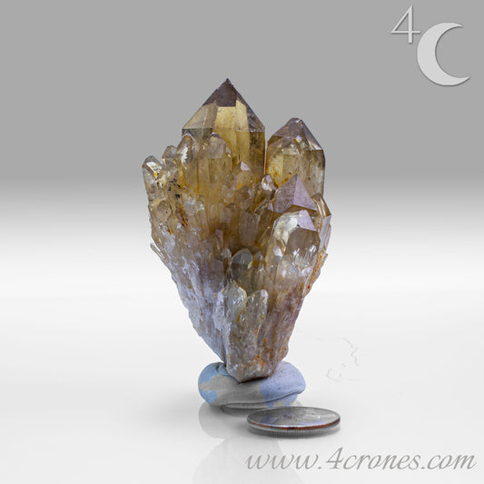 Kundalini Citrine Quartz is a stunning and rare variety of Citrine found exclusively in the Democratic Republic of Congo. This Natural Citrine is also characterized by a distinct formation of multiple terminated smaller Kundalini Quartz crystals.