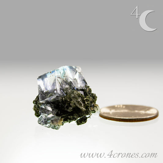 Yaogangxian fluorite is cherished for its exceptional quality and crisp beauty with stunning water-like cubic crystals and purple-blue phantoms that create a mesmerizing effect. www.4crones.com