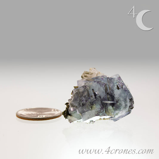 Yaogangxian fluorite is cherished for its exceptional quality and crisp beauty with stunning water-like cubic crystals and purple-blue phantoms that create a mesmerizing effect. www.4crones.com