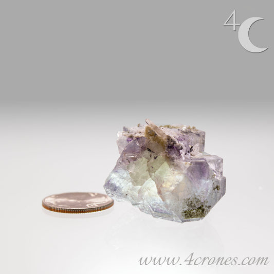 Yaogangxian fluorite is cherished for its exceptional quality and crisp beauty with stunning water-like cubic crystals and purple-blue phantoms that create a mesmerizing effect. www.4crones.com