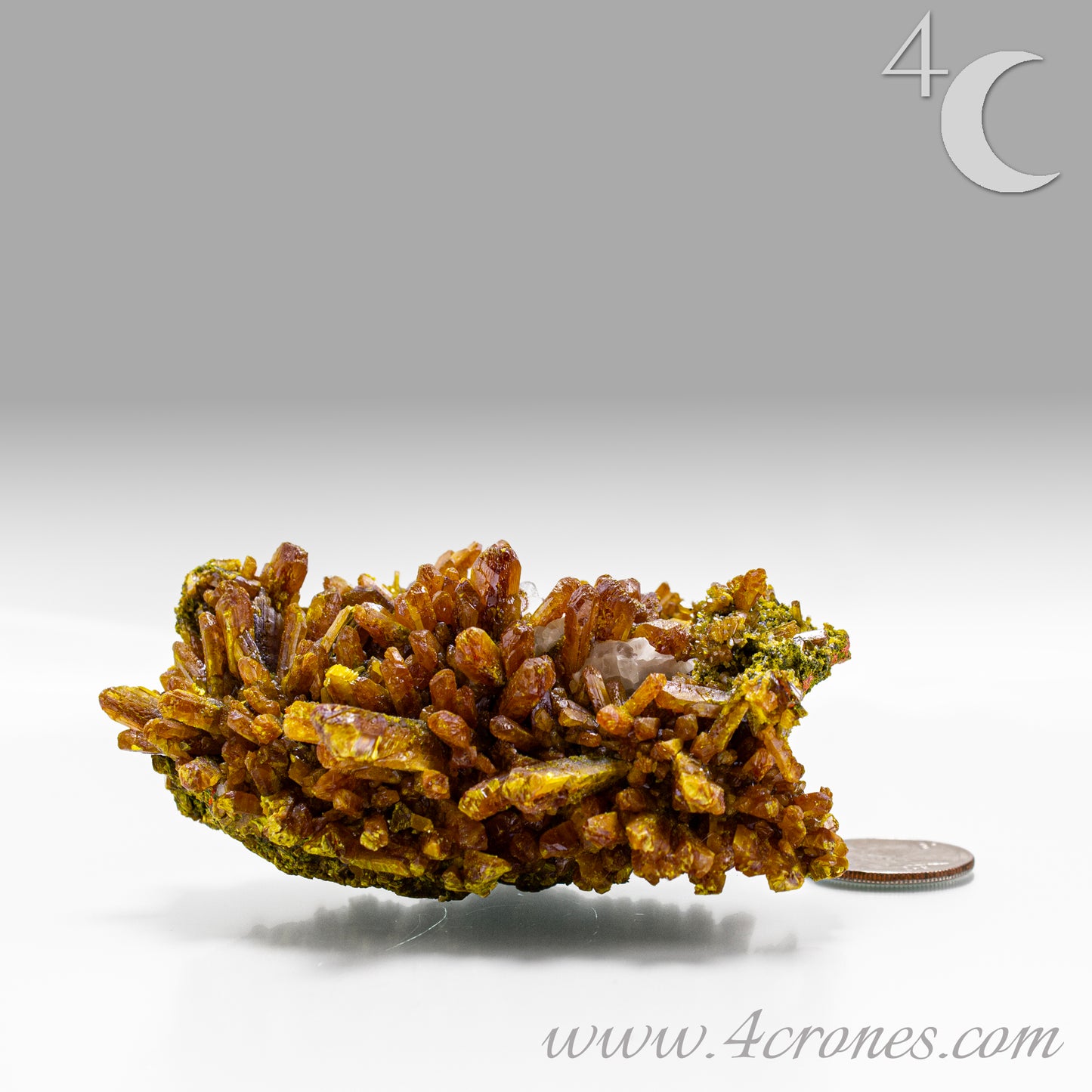 Orpiment mineral with layered golden formation on matrix, side view