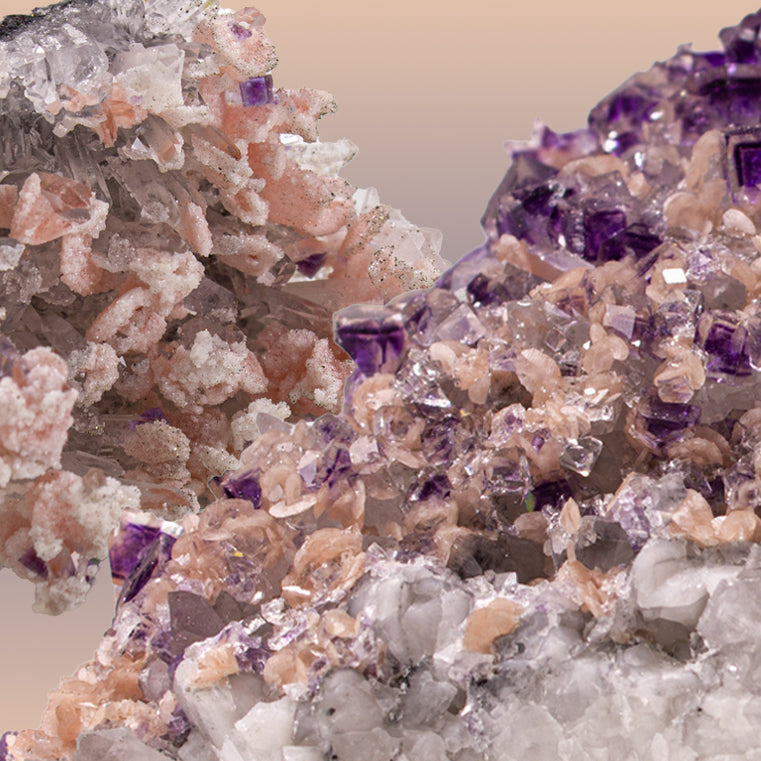 This curated collection celebrates the radiant union of Rhodochrosite and Purple Fluorite—a rare pairing that bridges the emotional heart and intuitive mind