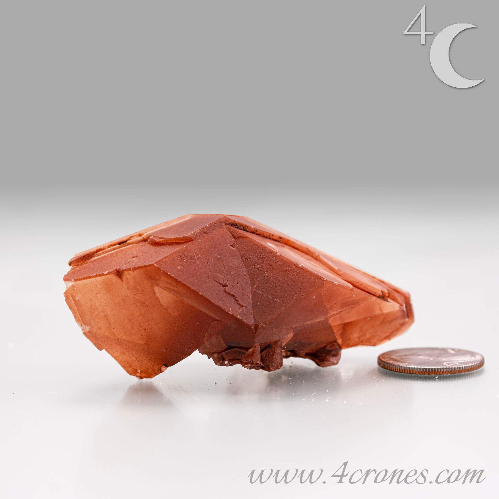 Red Diamond Calcite, glassy, gemmy diamond shaped geometries otherwise known as rhombohedrons and or scalenohedrons are combined with iron oxide hematoid inclusions. www.4crones.com
