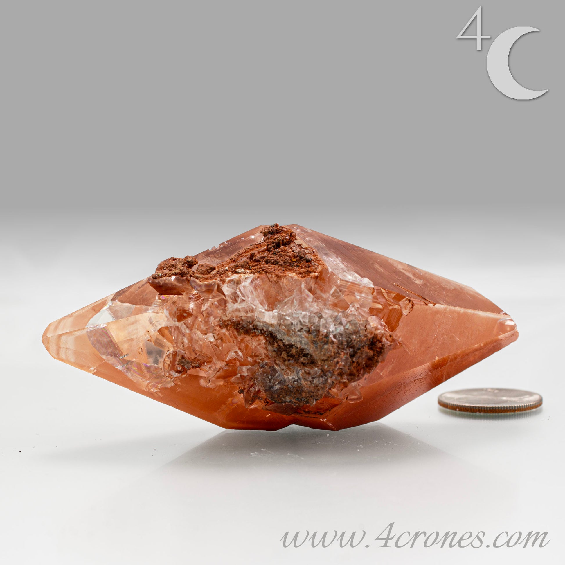 Red Diamond Calcite, glassy, gemmy diamond shaped geometries otherwise known as rhombohedrons and or scalenohedrons are combined with iron oxide hematoid inclusions. www.4crones.com