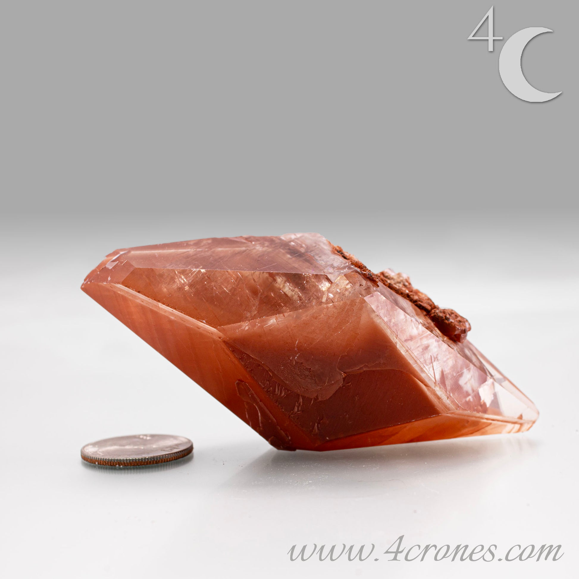 Red Diamond Calcite, glassy, gemmy diamond shaped geometries otherwise known as rhombohedrons and or scalenohedrons are combined with iron oxide hematoid inclusions. www.4crones.com