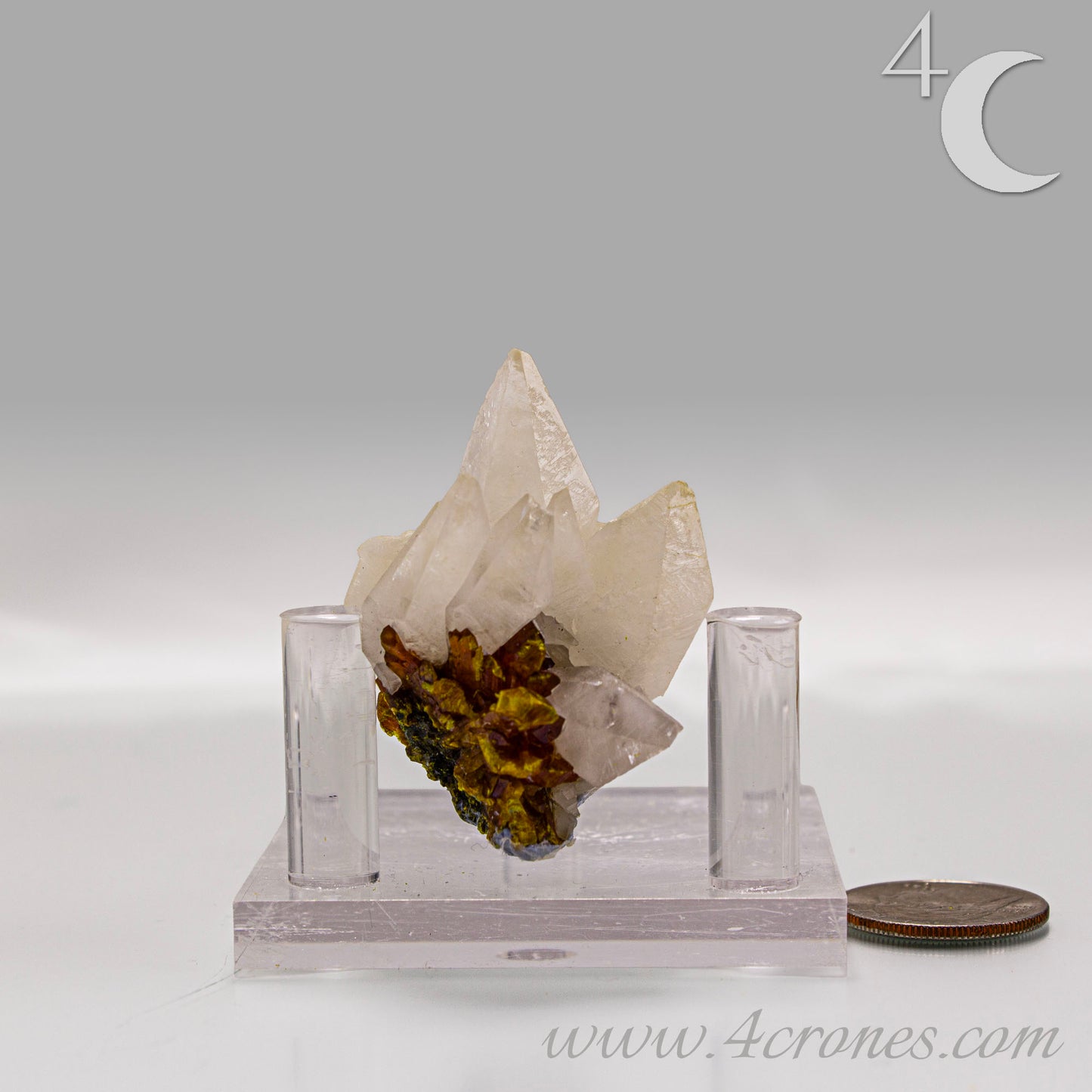 Orpiment mineral with layered golden formation on light matrix, side view