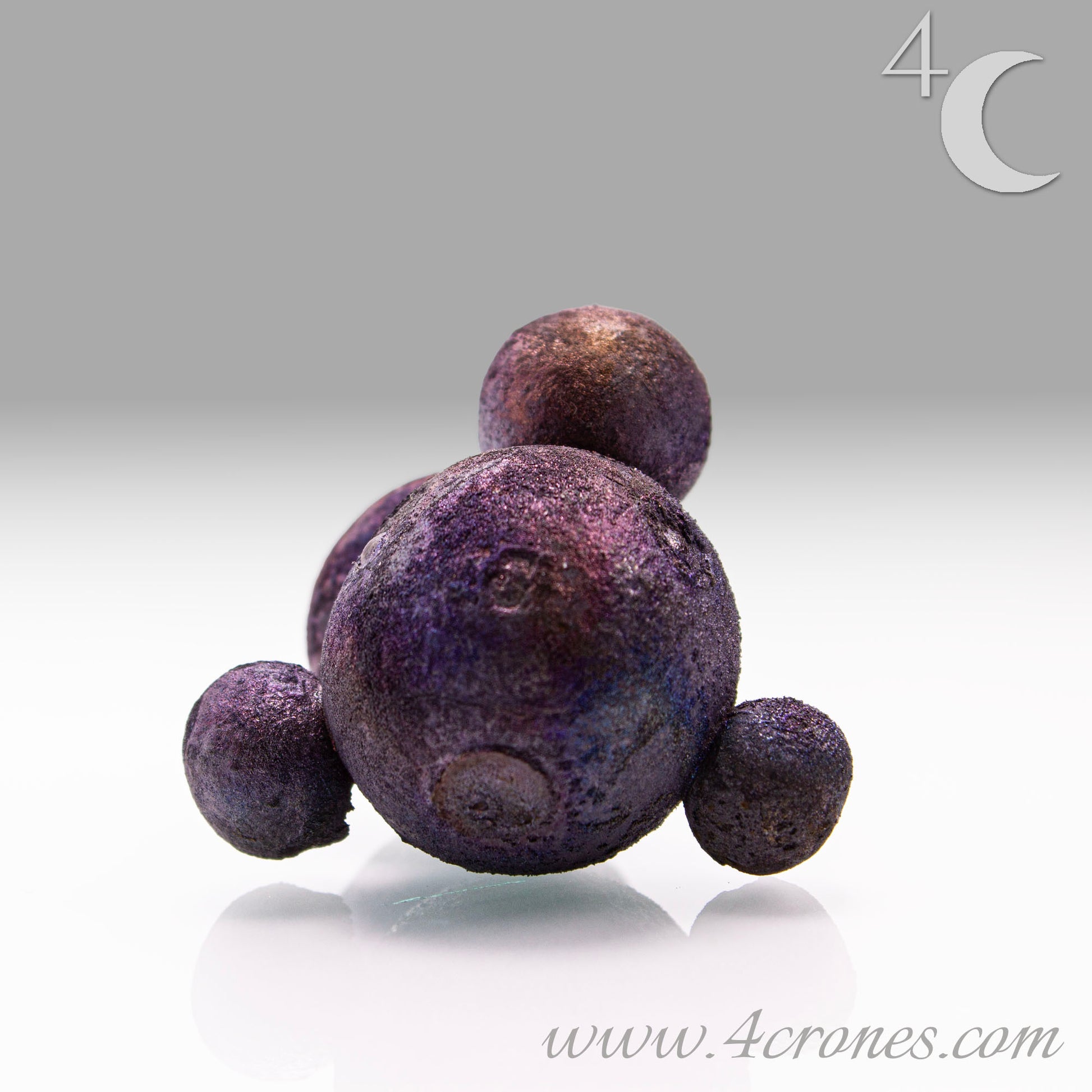 These stunning Chalcopyrite copper iron sulfide spheres (CuFeS₂) showcase a metallic golden luster with vibrant iridescent hues of purple, blue, and green. Formed through hydrothermal processes in Daye, Hubei Province, they crystallize in the tetragonal system and are valued for their aesthetic and energetic properties.