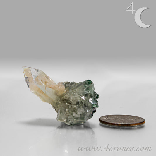 Clear apophyllite crystals intergrown with peach stilbite, natural zeolite mineral specimen from India.