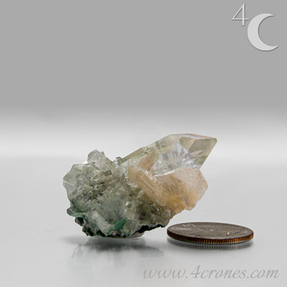 Clear apophyllite crystals intergrown with peach stilbite, natural zeolite mineral specimen from India.