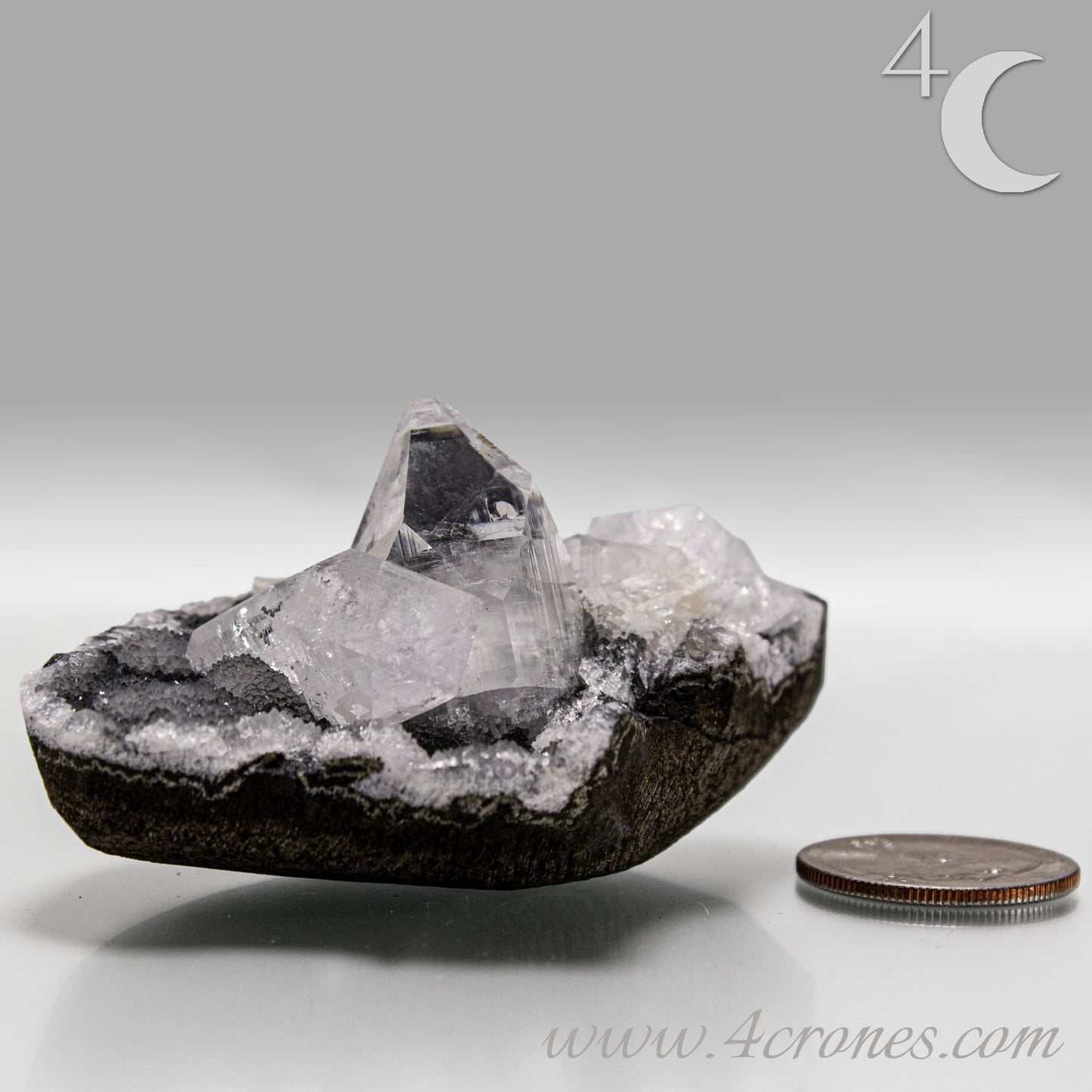 Clear apophyllite crystals growing on chalcedony matrix, natural mineral specimen from India