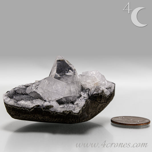 Clear apophyllite crystals growing on chalcedony matrix, natural mineral specimen from India