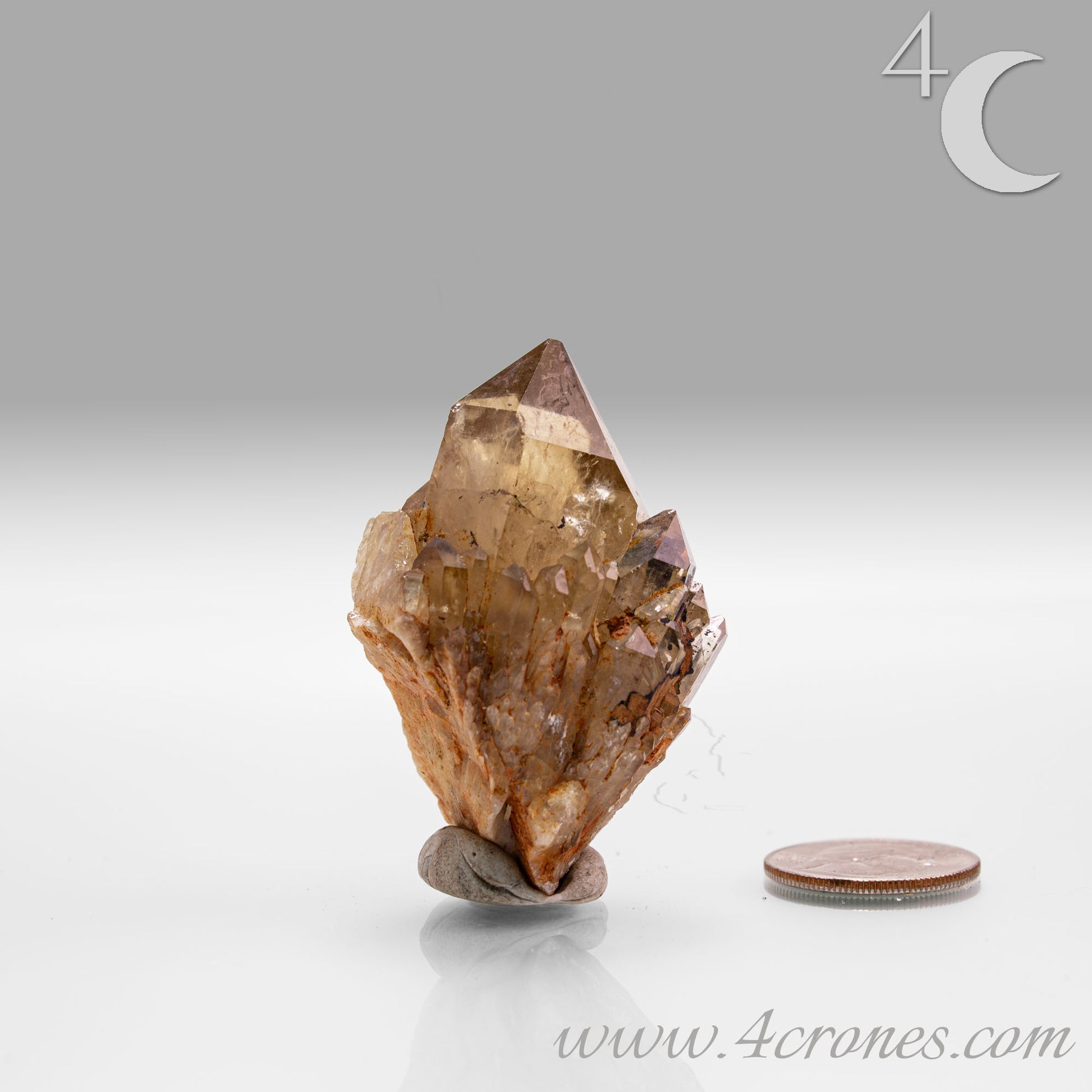 Kundalini Citrine Quartz is a stunning and rare variety of Citrine found exclusively in the Democratic Republic of Congo. This Natural Citrine is also characterized by a distinct formation of multiple terminated smaller Kundalini Quartz crystals.