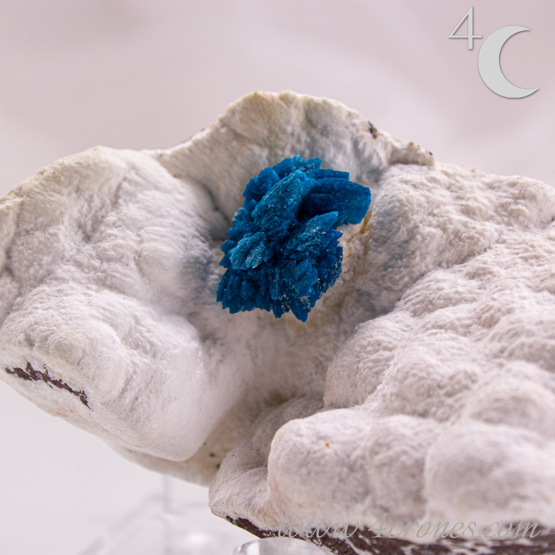 Cavansite is a rare calcium vanadium silicate mineral prized for its vivid blue color and rosette-like crystal formations