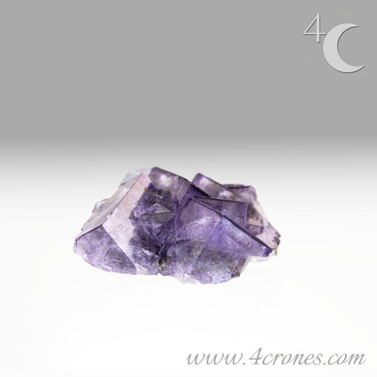 Yaogangxian  fluorite is cherished for its exceptional quality and crisp beauty with stunning water-like cubic crystals and purple-blue phantoms that create a mesmerizing effect.  www.4crones.com