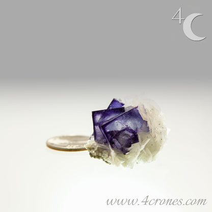 Yaogangxian  fluorite is cherished for its exceptional quality and crisp beauty with stunning water-like cubic crystals and purple-blue phantoms that create a mesmerizing effect.  www.4crones.com