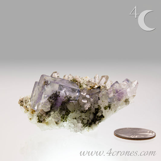 Yaogangxian  fluorite is cherished for its exceptional quality and crisp beauty with stunning water-like cubic crystals and purple-blue phantoms that create a mesmerizing effect.  www.4crones.com