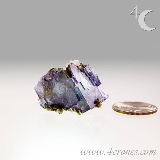Yaogangxian  fluorite is cherished for its exceptional quality and crisp beauty with stunning water-like cubic crystals and purple-blue phantoms that create a mesmerizing effect.  www.4crones.com