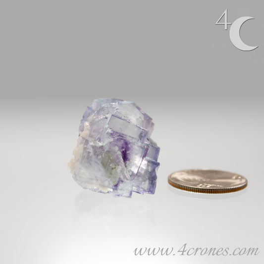 Yaogangxian  fluorite is cherished for its exceptional quality and crisp beauty with stunning water-like cubic crystals and purple-blue phantoms that create a mesmerizing effect.  www.4crones.com