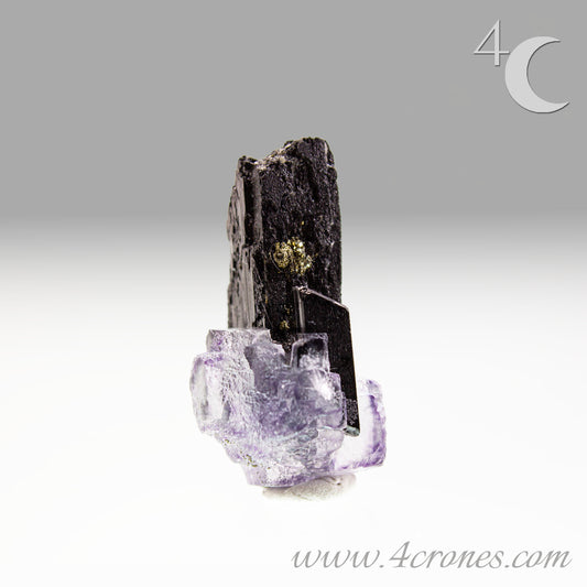 This specimen also has an amazing wolframite "tower" with a pyrite widow.&nbsp; Seriously pure magic from our mineral kingdom.www.4crones.com