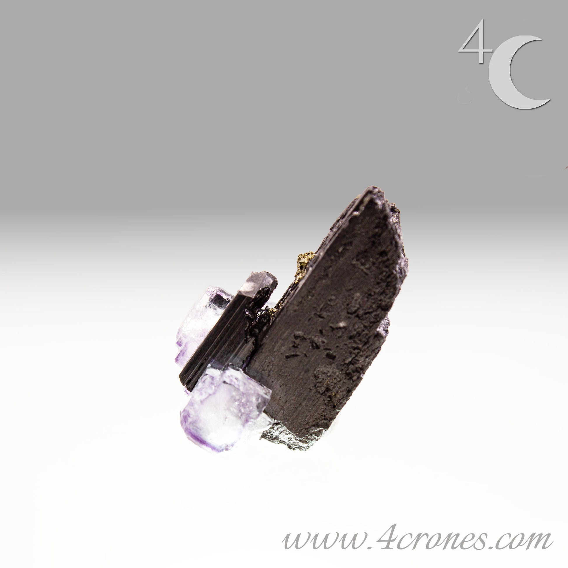 This specimen also has an amazing wolframite "tower" with a pyrite widow.&nbsp; Seriously pure magic from our mineral kingdom.www.4crones.com