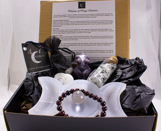 Gift box with crystals, a bracelet, and a bottle labeled '4 Canes' on a white background.