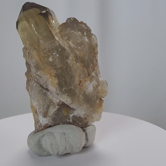 Kundalini Citrine Quartz is a stunning and rare variety of Citrine found exclusively in the Democratic Republic of Congo. This Natural Citrine is also characterized by a distinct formation of multiple terminated smaller Kundalini Quartz crystals.