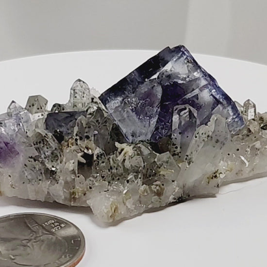 Yaogangxian  fluorite is cherished for its exceptional quality and crisp beauty with stunning water-like cubic crystals and purple-blue phantoms that create a mesmerizing effect.  www.4crones.com