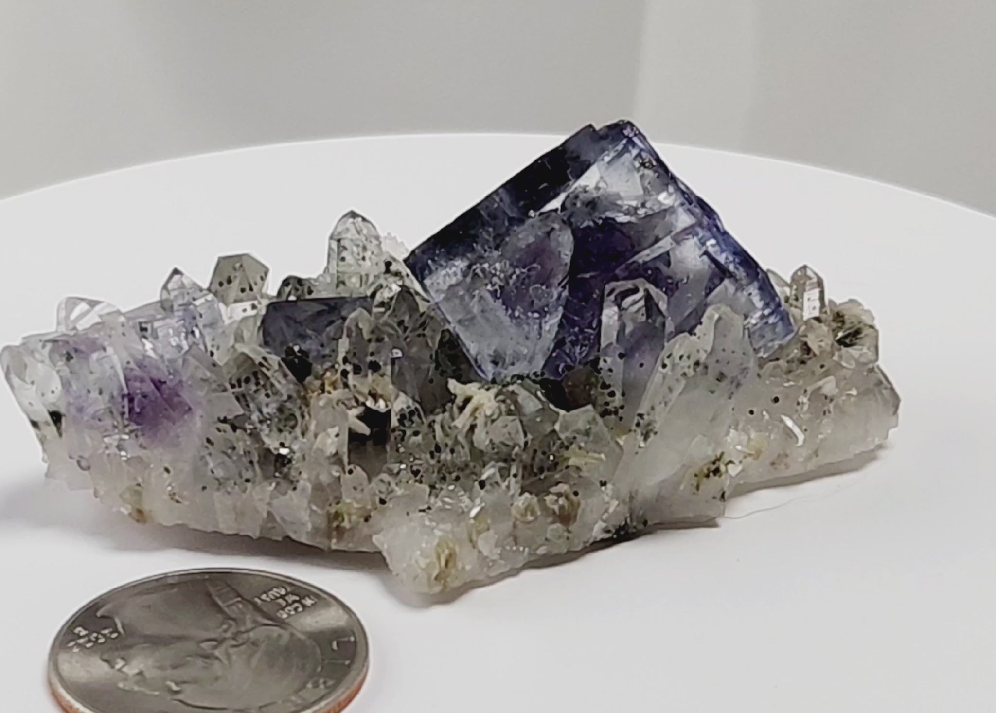 Yaogangxian  fluorite is cherished for its exceptional quality and crisp beauty with stunning water-like cubic crystals and purple-blue phantoms that create a mesmerizing effect.  www.4crones.com