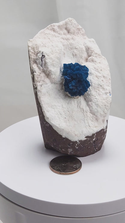 Cavansite is a rare calcium vanadium silicate mineral prized for its vivid blue color and rosette-like crystal formations
