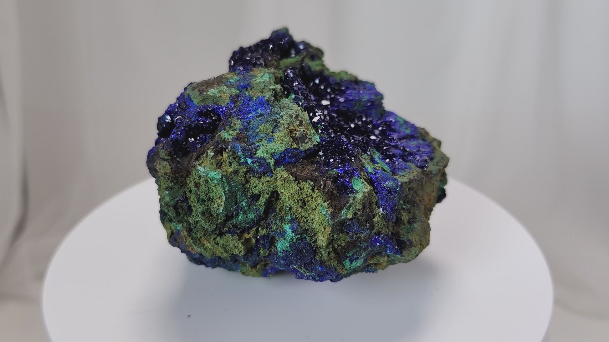 4 Crones Azurite-Malachite specimens are so luscious, with spectacular gemmy azurite crystals showing off the heavenly deep blue colors they are renowned for. They can be found in combination with Malachite acting as a “matrix” of sorts. Azurite is often found in nature mixed with Malachite. With more water content Azurite becomes Malachite. We think of them as siblings whose differing energies complement each other:)  www.4crones.com