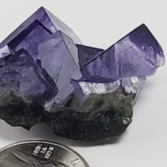 Yaogangxian  fluorite is cherished for its exceptional quality and crisp beauty with stunning water-like cubic crystals and purple-blue phantoms that create a mesmerizing effect. www.4crones.com
