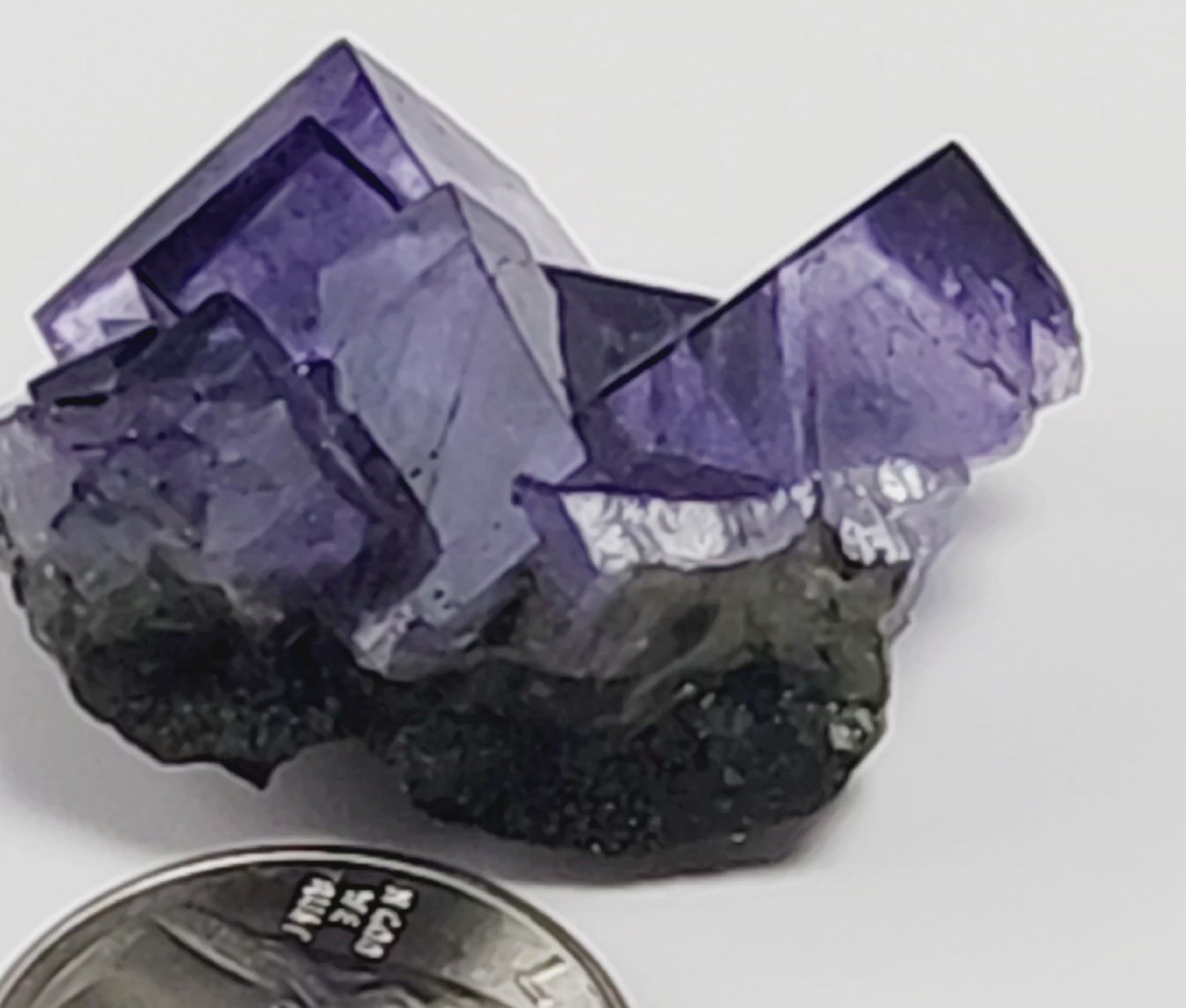 Yaogangxian  fluorite is cherished for its exceptional quality and crisp beauty with stunning water-like cubic crystals and purple-blue phantoms that create a mesmerizing effect. www.4crones.com