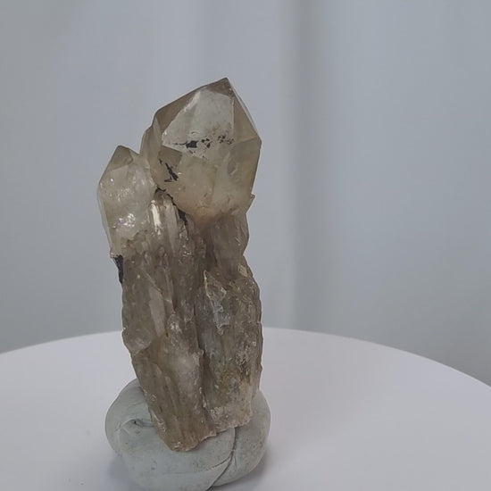 Kundalini Citrine Quartz is a stunning and rare variety of Citrine found exclusively in the Democratic Republic of Congo. This Natural Citrine is also characterized by a distinct formation of multiple terminated smaller Kundalini Quartz crystals.