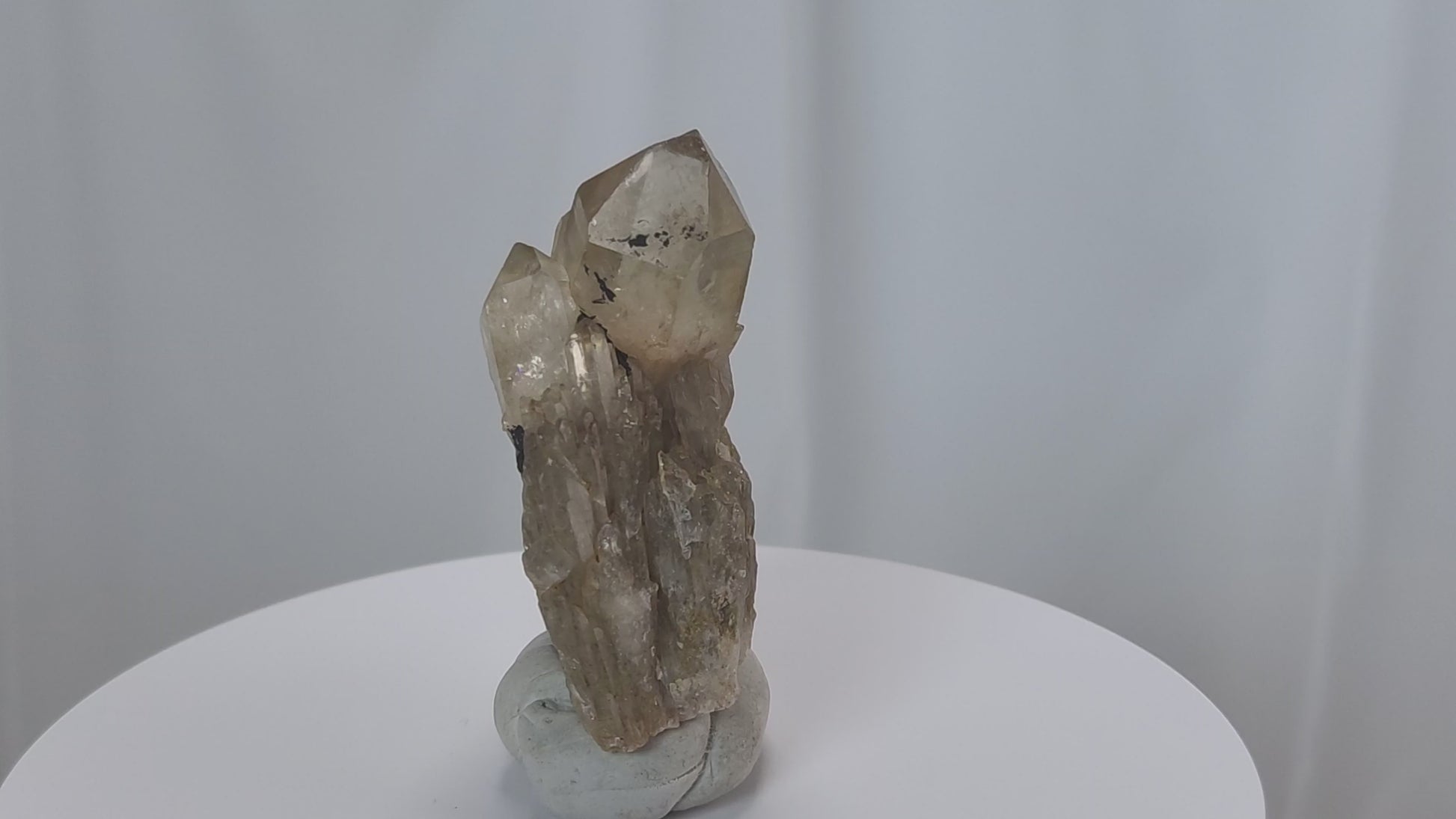 Kundalini Citrine Quartz is a stunning and rare variety of Citrine found exclusively in the Democratic Republic of Congo. This Natural Citrine is also characterized by a distinct formation of multiple terminated smaller Kundalini Quartz crystals.