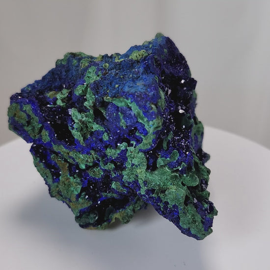 4 Crones Azurite-Malachite specimens are so luscious, with spectacular gemmy azurite crystals showing off the heavenly deep blue colors they are renowned for. They can be found in combination with Malachite acting as a “matrix” of sorts. Azurite is often found in nature mixed with Malachite. With more water content Azurite becomes Malachite. We think of them as siblings whose differing energies complement each other:)  www.4crones.com