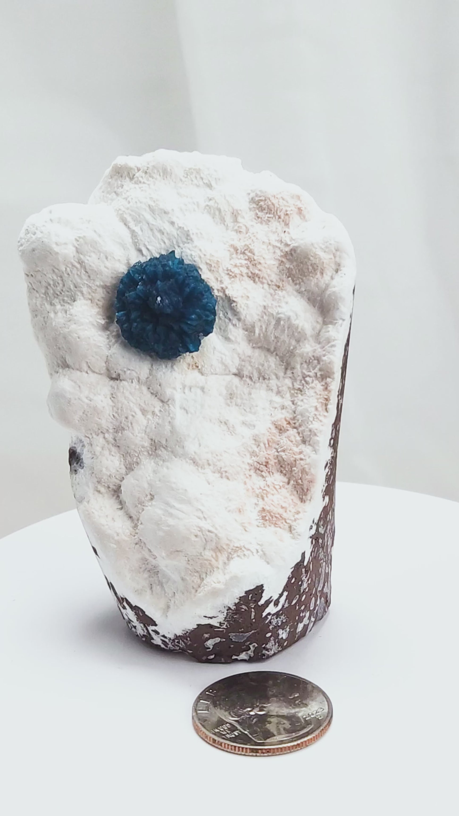 Cavansite is a rare calcium vanadium silicate mineral prized for its vivid blue color and rosette-like crystal formations