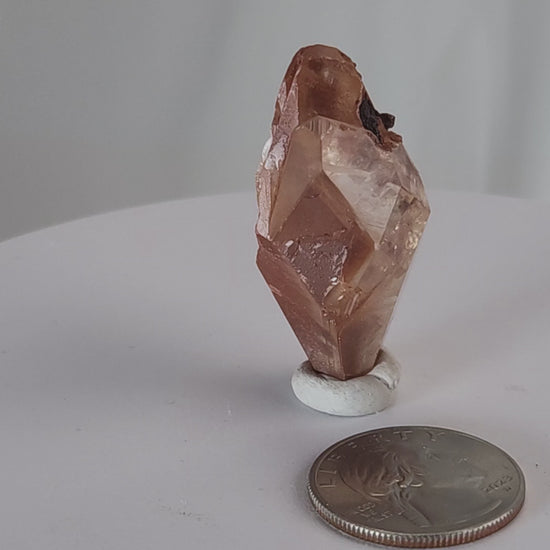 Red Diamond Calcite, glassy, gemmy diamond shaped geometries otherwise known as rhombohedrons and or scalenohedrons are combined with iron oxide hematoid inclusions. www.4crones.com