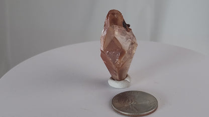 Red Diamond Calcite, glassy, gemmy diamond shaped geometries otherwise known as rhombohedrons and or scalenohedrons are combined with iron oxide hematoid inclusions. www.4crones.com
