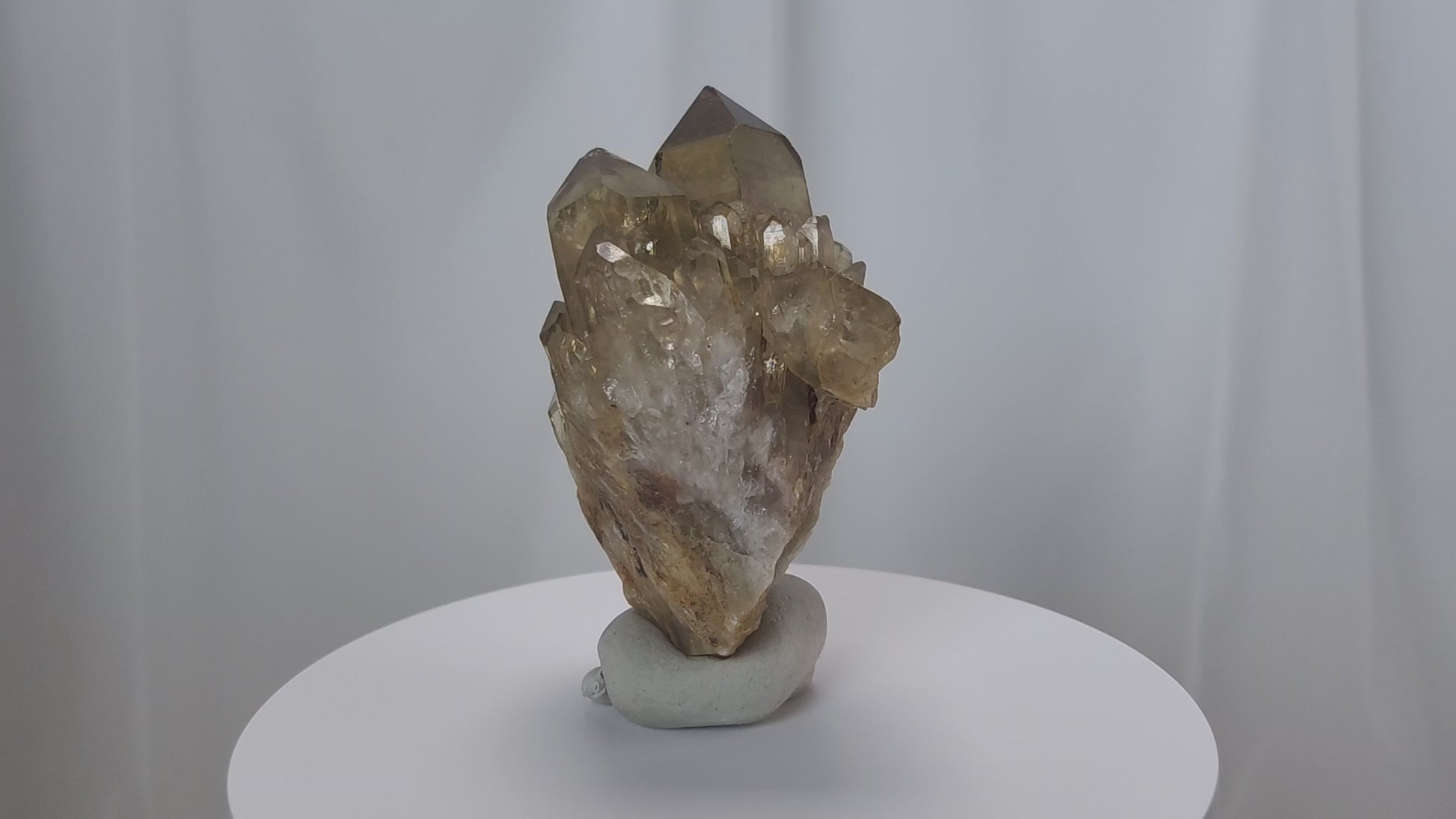 Kundalini Citrine Quartz is a stunning and rare variety of Citrine found exclusively in the Democratic Republic of Congo. This Natural Citrine is also characterized by a distinct formation of multiple terminated smaller Kundalini Quartz crystals.