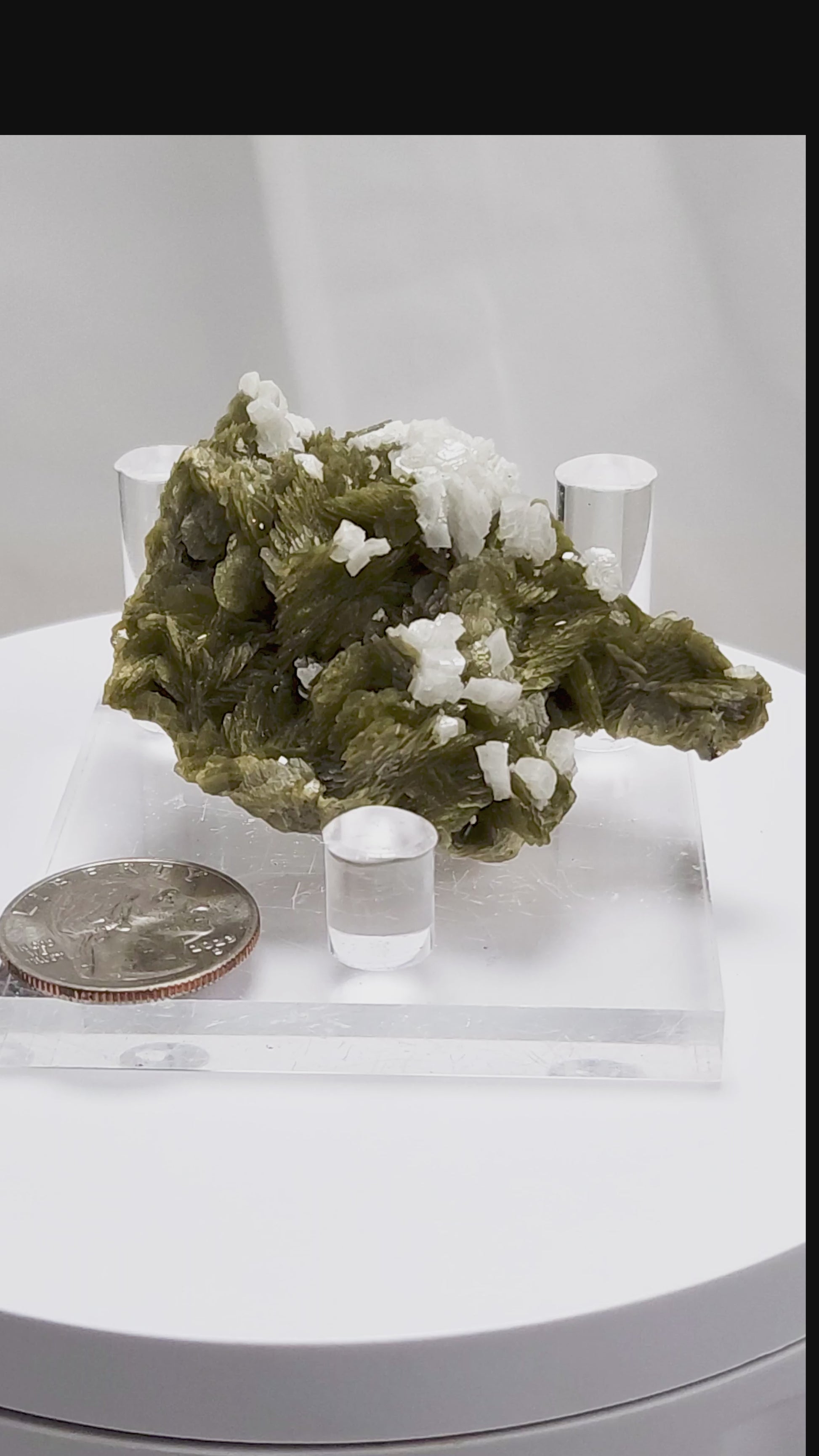 This unique pairing of Siderite, an iron carbonate mineral, and Dolomite, a calcium magnesium carbonate, forms in earthy clusters and blocky crystals that range from honeyed brown to soft cream.
