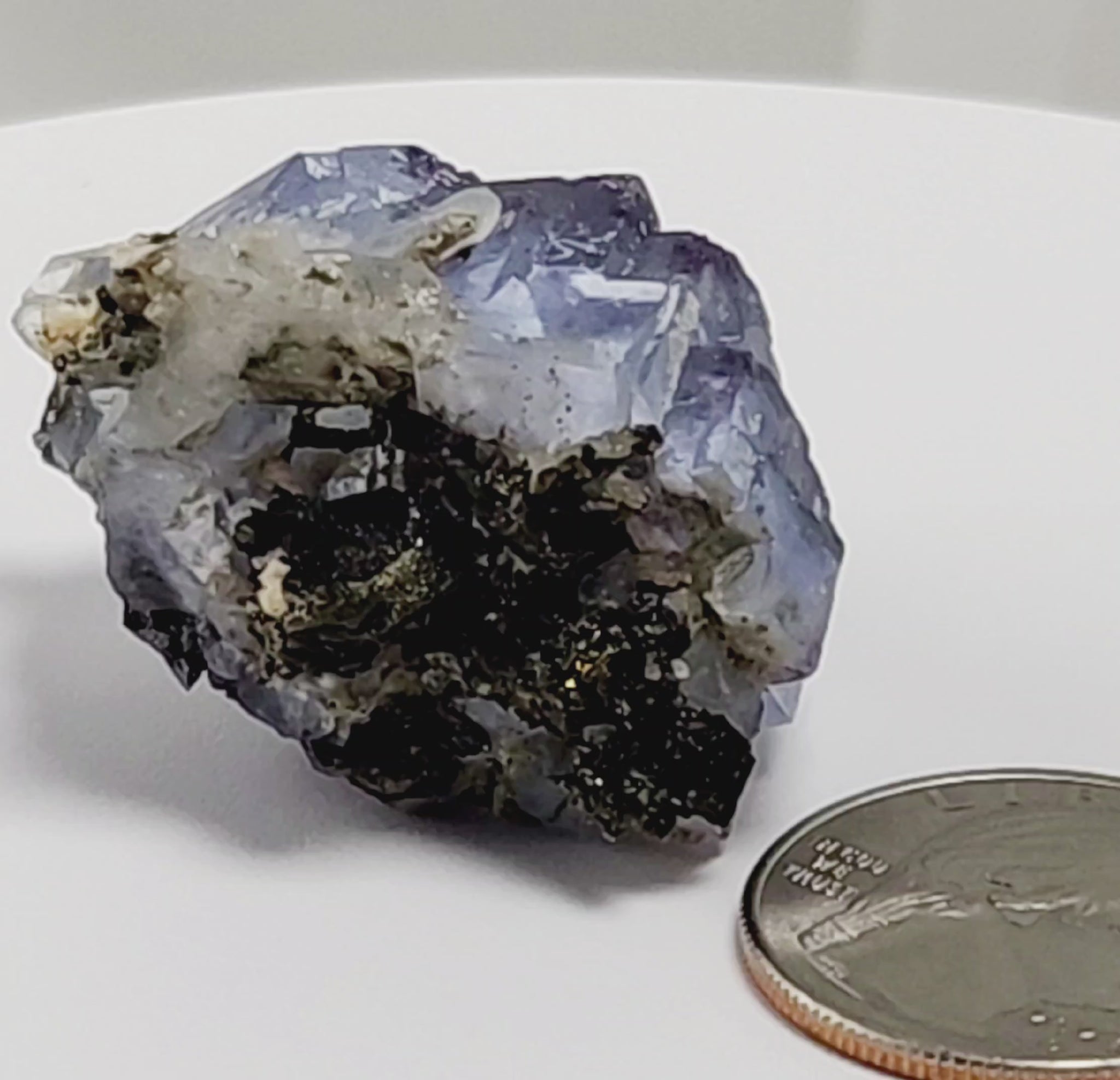 Yaogangxian  fluorite is cherished for its exceptional quality and crisp beauty with stunning water-like cubic crystals and purple-blue phantoms that create a mesmerizing effect.  www.4cones.com