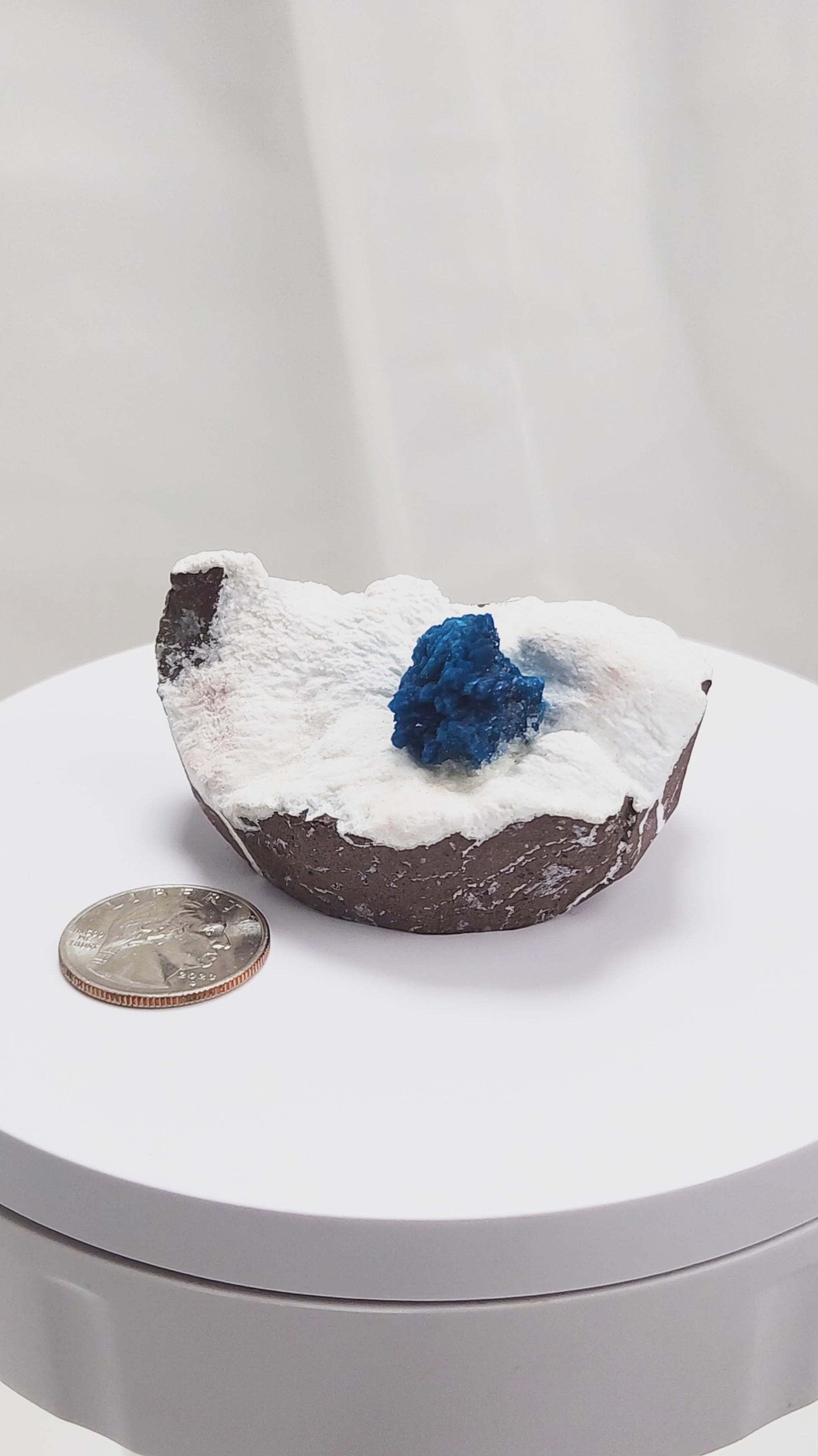 Cavansite is a rare calcium vanadium silicate mineral prized for its vivid blue color and rosette-like crystal formations